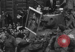 Image of FFI fighters playing with Hitler portrait Paris France, 1944, second 43 stock footage video 65675079512