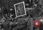 Image of FFI fighters playing with Hitler portrait Paris France, 1944, second 45 stock footage video 65675079512