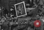 Image of FFI fighters playing with Hitler portrait Paris France, 1944, second 46 stock footage video 65675079512