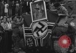 Image of FFI fighters playing with Hitler portrait Paris France, 1944, second 53 stock footage video 65675079512