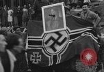 Image of FFI fighters playing with Hitler portrait Paris France, 1944, second 56 stock footage video 65675079512
