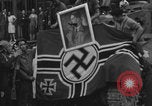 Image of FFI fighters playing with Hitler portrait Paris France, 1944, second 57 stock footage video 65675079512