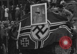 Image of FFI fighters playing with Hitler portrait Paris France, 1944, second 58 stock footage video 65675079512