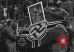 Image of FFI fighters playing with Hitler portrait Paris France, 1944, second 59 stock footage video 65675079512