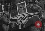 Image of FFI fighters playing with Hitler portrait Paris France, 1944, second 60 stock footage video 65675079512