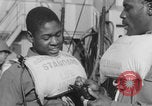 Image of African American soldiers wearing life vests Europe, 1944, second 18 stock footage video 65675079531