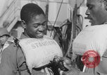 Image of African American soldiers wearing life vests Europe, 1944, second 20 stock footage video 65675079531