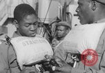 Image of African American soldiers wearing life vests Europe, 1944, second 24 stock footage video 65675079531