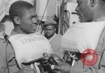 Image of African American soldiers wearing life vests Europe, 1944, second 25 stock footage video 65675079531