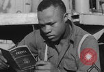 Image of African American soldiers socializing together Europe, 1944, second 39 stock footage video 65675079534