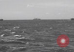 Image of US APA ships sailing Kerama Islands Pacific Ocean, 1945, second 25 stock footage video 65675079537