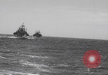 Image of US APA ships sailing Kerama Islands Pacific Ocean, 1945, second 30 stock footage video 65675079537