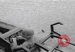 Image of US soldier driving Japanese suicide motorboat Japan, 1945, second 10 stock footage video 65675079539