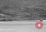 Image of US soldier driving Japanese suicide motorboat Japan, 1945, second 13 stock footage video 65675079539
