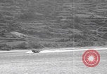 Image of US soldier driving Japanese suicide motorboat Japan, 1945, second 17 stock footage video 65675079539