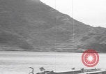 Image of US soldier driving Japanese suicide motorboat Japan, 1945, second 27 stock footage video 65675079539