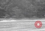 Image of US soldier driving Japanese suicide motorboat Japan, 1945, second 29 stock footage video 65675079539