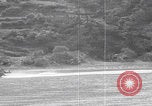 Image of US soldier driving Japanese suicide motorboat Japan, 1945, second 31 stock footage video 65675079539