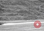 Image of US soldier driving Japanese suicide motorboat Japan, 1945, second 34 stock footage video 65675079539