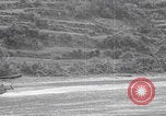 Image of US soldier driving Japanese suicide motorboat Japan, 1945, second 35 stock footage video 65675079539