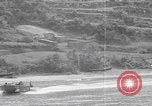 Image of US soldier driving Japanese suicide motorboat Japan, 1945, second 37 stock footage video 65675079539