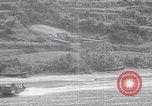Image of US soldier driving Japanese suicide motorboat Japan, 1945, second 38 stock footage video 65675079539