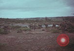 Image of Operation Wallowa US 1st Brigade 7th Cavalry walking Vietnam, 1967, second 14 stock footage video 65675079543