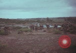 Image of Operation Wallowa US 1st Brigade 7th Cavalry walking Vietnam, 1967, second 16 stock footage video 65675079543