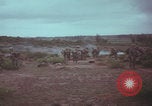 Image of Operation Wallowa US 1st Brigade 7th Cavalry walking Vietnam, 1967, second 18 stock footage video 65675079543