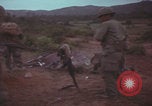 Image of Operation Wallowa US 1st Brigade 7th Cavalry walking Vietnam, 1967, second 32 stock footage video 65675079543