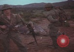 Image of Operation Wallowa US 1st Brigade 7th Cavalry walking Vietnam, 1967, second 34 stock footage video 65675079543