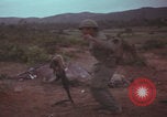 Image of Operation Wallowa US 1st Brigade 7th Cavalry walking Vietnam, 1967, second 40 stock footage video 65675079543