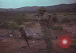Image of Operation Wallowa US 1st Brigade 7th Cavalry walking Vietnam, 1967, second 41 stock footage video 65675079543