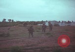 Image of Operation Wallowa US 1st Brigade 7th Cavalry walking Vietnam, 1967, second 44 stock footage video 65675079543
