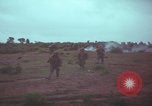 Image of Operation Wallowa US 1st Brigade 7th Cavalry walking Vietnam, 1967, second 45 stock footage video 65675079543