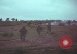 Image of Operation Wallowa US 1st Brigade 7th Cavalry walking Vietnam, 1967, second 46 stock footage video 65675079543