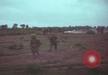 Image of Operation Wallowa US 1st Brigade 7th Cavalry walking Vietnam, 1967, second 49 stock footage video 65675079543