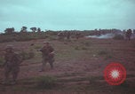 Image of Operation Wallowa US 1st Brigade 7th Cavalry walking Vietnam, 1967, second 51 stock footage video 65675079543