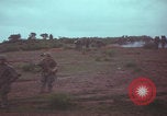 Image of Operation Wallowa US 1st Brigade 7th Cavalry walking Vietnam, 1967, second 52 stock footage video 65675079543
