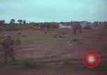 Image of Operation Wallowa US 1st Brigade 7th Cavalry walking Vietnam, 1967, second 60 stock footage video 65675079543