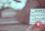 Image of Vietnamese villagers with US soldiers Vietnam, 1967, second 4 stock footage video 65675079546