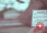 Image of Vietnamese villagers with US soldiers Vietnam, 1967, second 6 stock footage video 65675079546