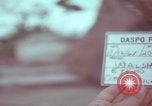 Image of Vietnamese villagers with US soldiers Vietnam, 1967, second 7 stock footage video 65675079546