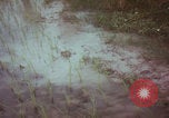 Image of Vietnamese villagers with US soldiers Vietnam, 1967, second 13 stock footage video 65675079546