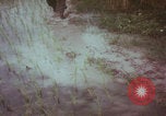 Image of Vietnamese villagers with US soldiers Vietnam, 1967, second 16 stock footage video 65675079546