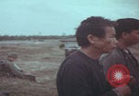 Image of Vietnamese villagers with US soldiers Vietnam, 1967, second 35 stock footage video 65675079546
