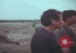 Image of Vietnamese villagers with US soldiers Vietnam, 1967, second 37 stock footage video 65675079546