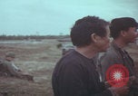 Image of Vietnamese villagers with US soldiers Vietnam, 1967, second 38 stock footage video 65675079546