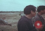 Image of Vietnamese villagers with US soldiers Vietnam, 1967, second 39 stock footage video 65675079546