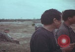 Image of Vietnamese villagers with US soldiers Vietnam, 1967, second 40 stock footage video 65675079546